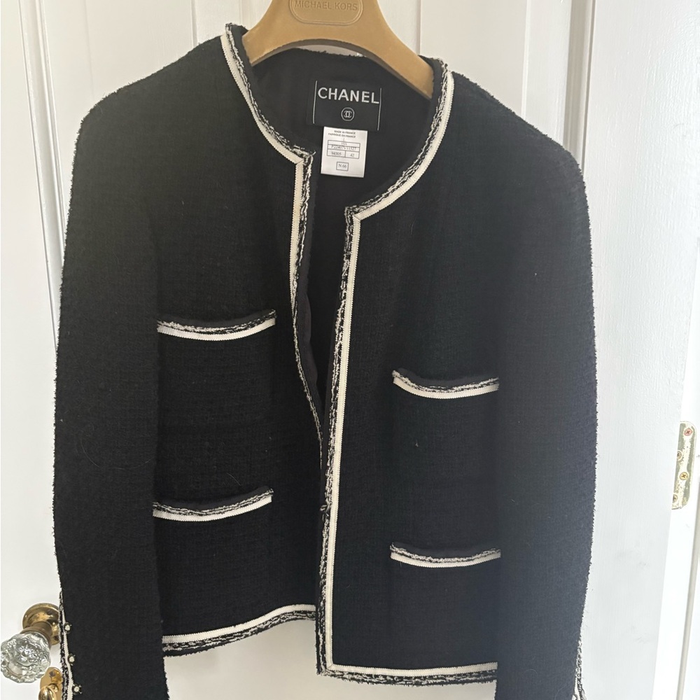 Chanel Elegant Black Blazer with White Accents
